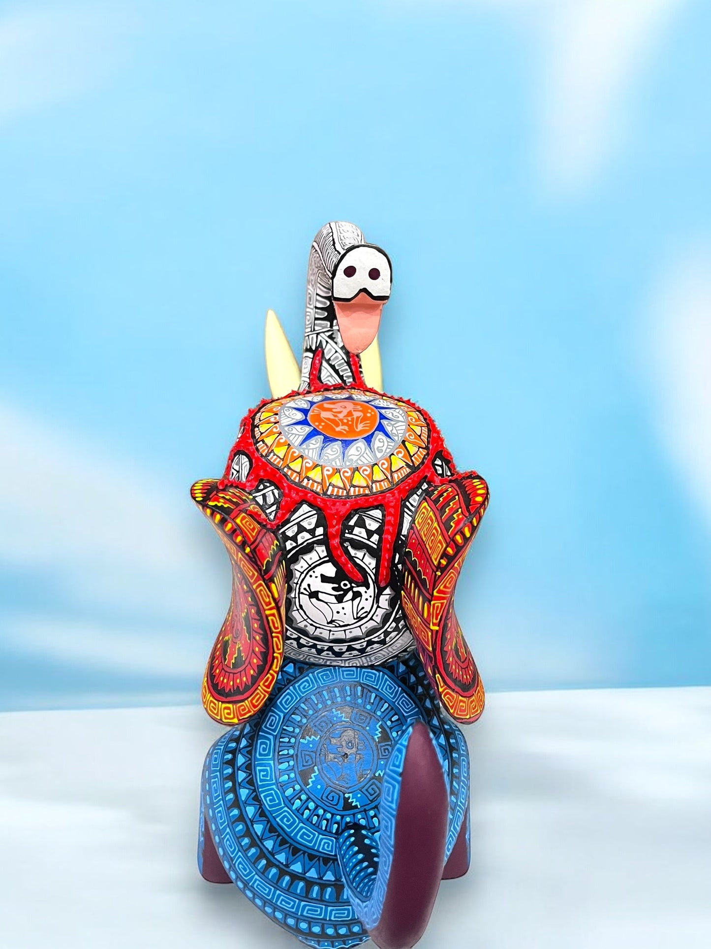 Alebrije de Elefante con Detalles Étnicos en Azul y Rojo